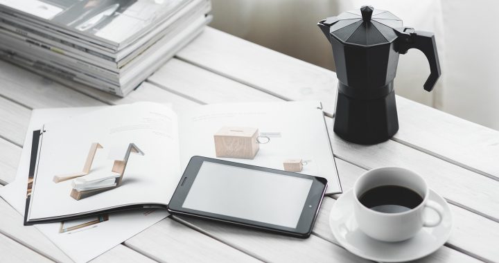 Technology, coffee cup, tablet — Unlocking Affordable Testosterone Replacement: A Review of Low-Cost Online TRT Clinics